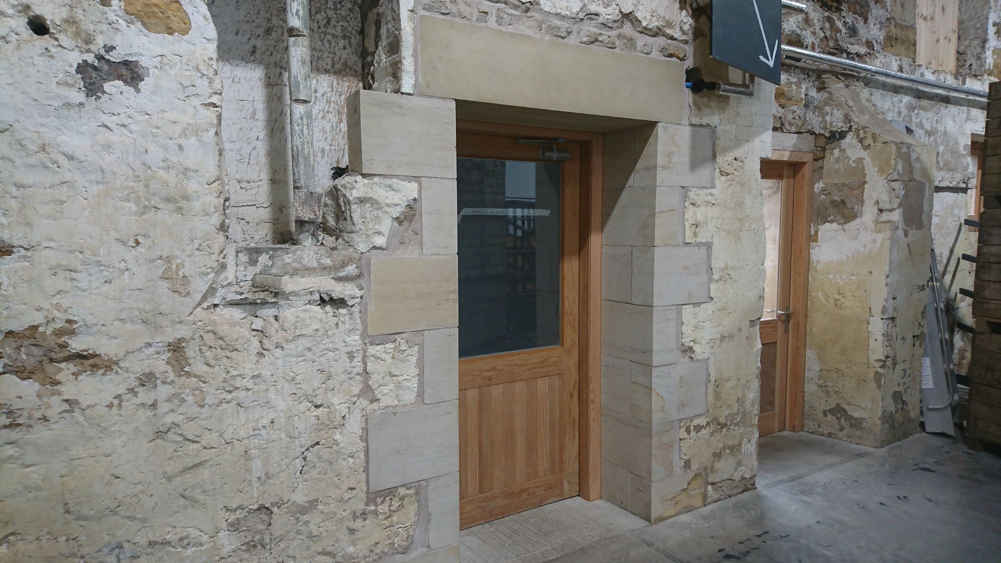 After-Bowhouse Cut through wall and fit stone quoins and lintels 
